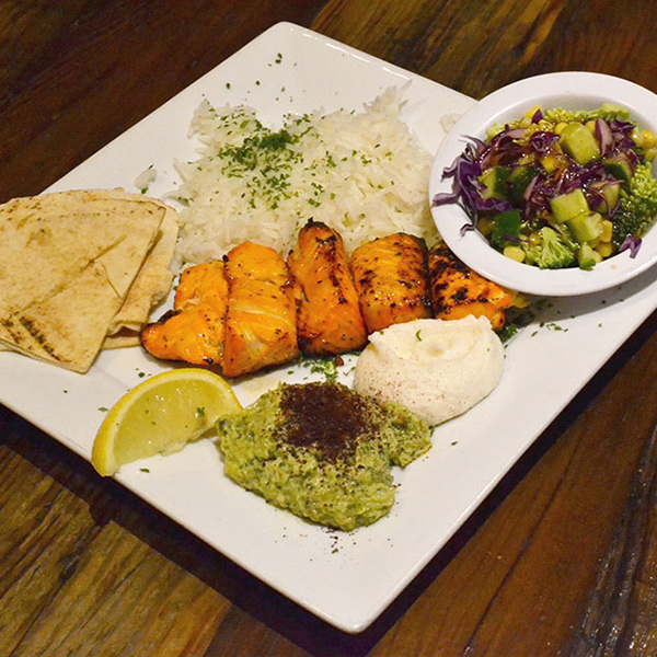 Persian-style kebabs with pita and rice