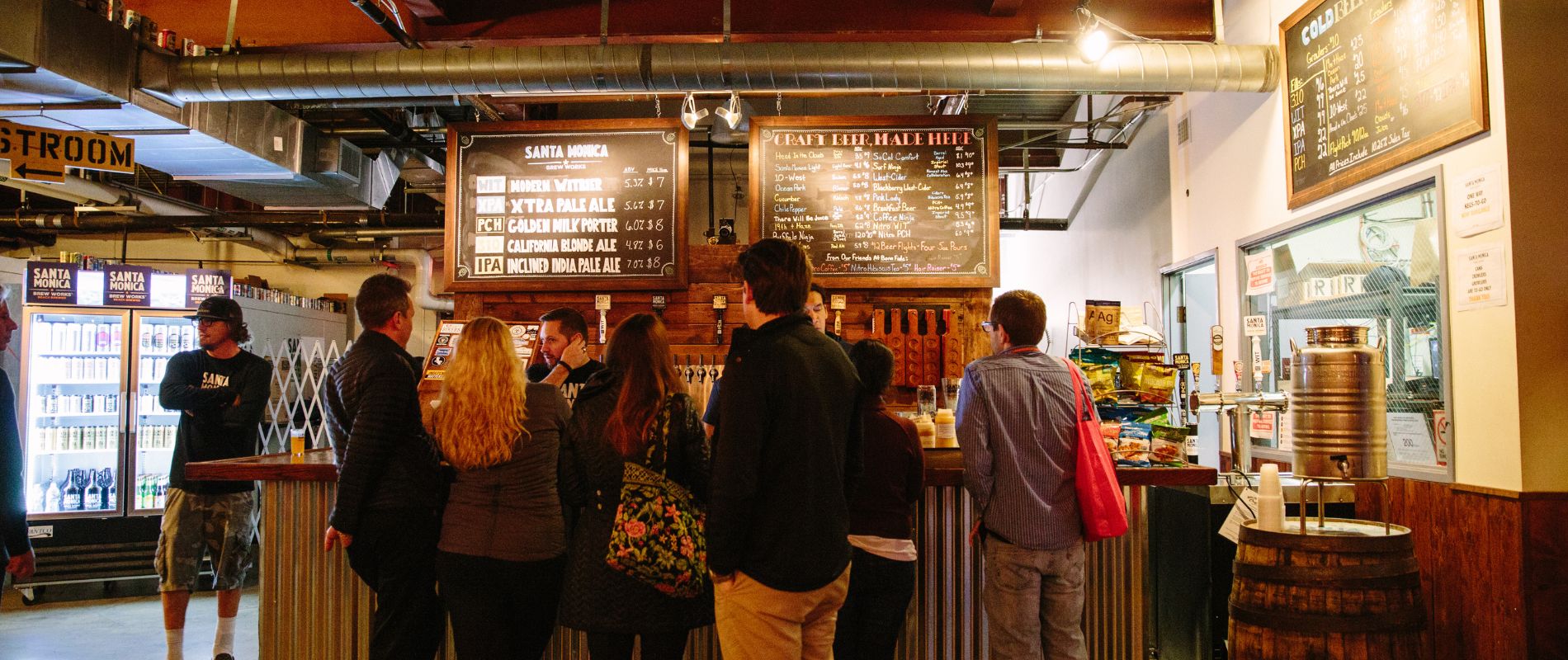 People standing at indoor bar