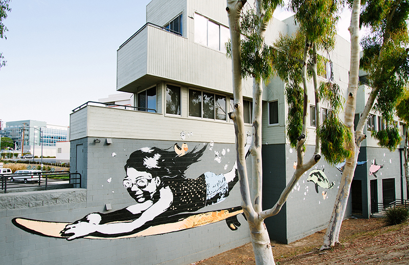 Mural of girl on surfboard 