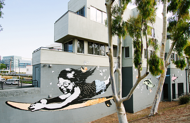 Mural of girl on surfboard