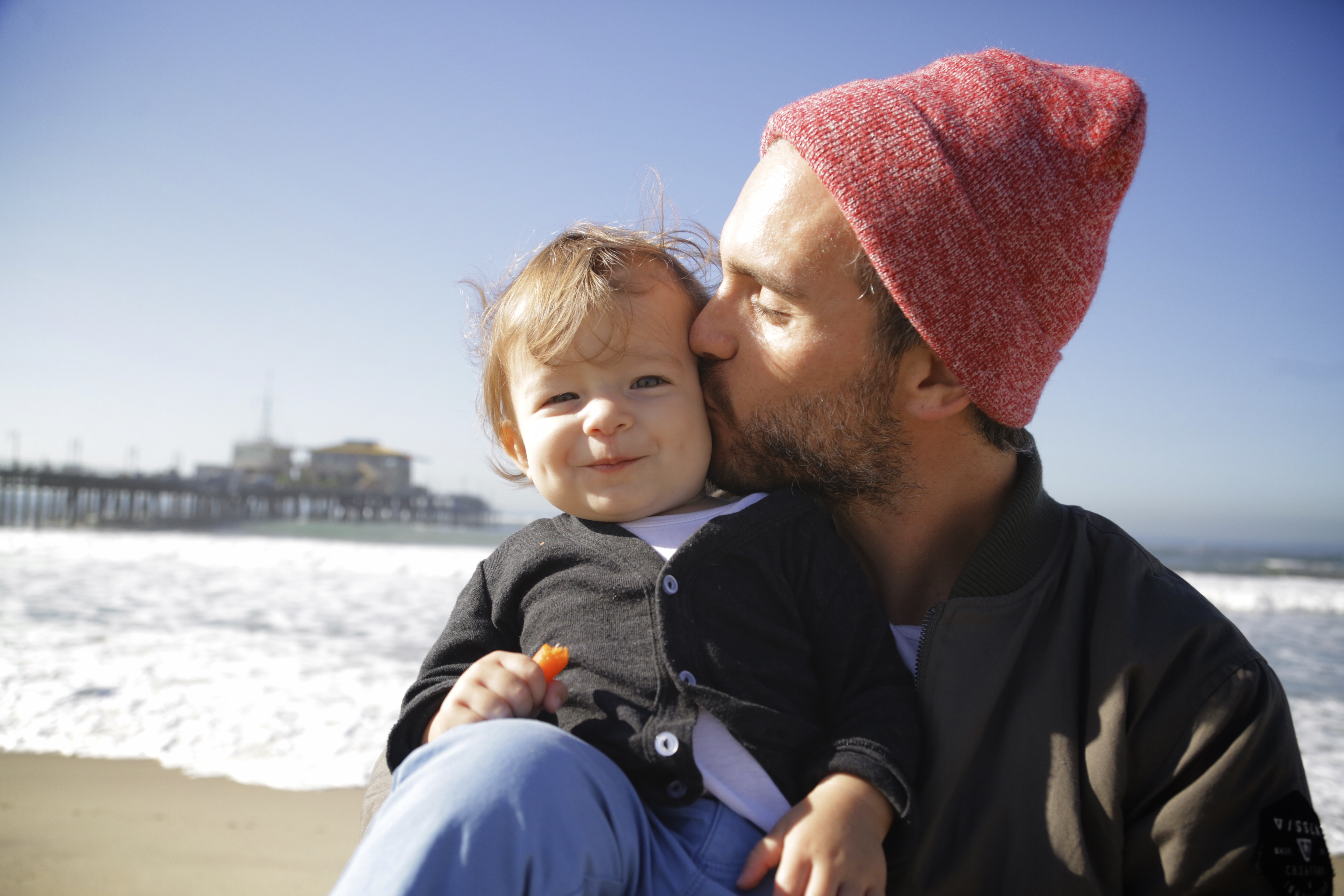 Father and young son on Santa Monica Beach