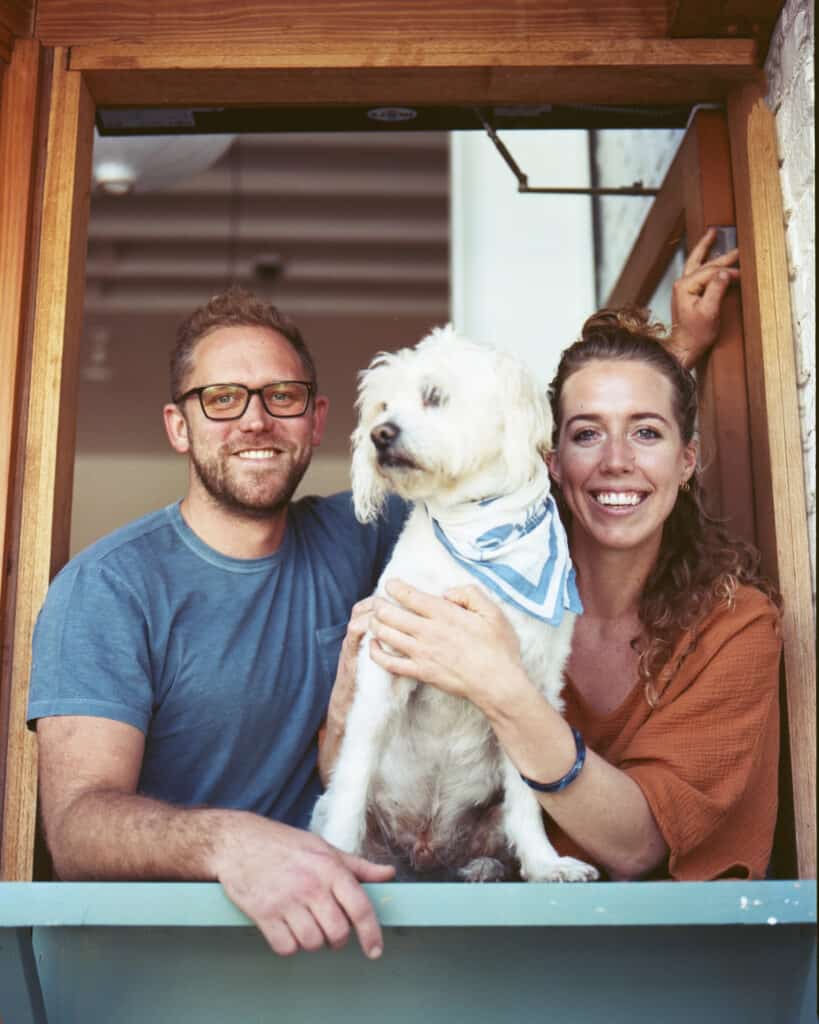 Brian Bornemann and Leena Culhane with a dog at Crudo e Nudo in Santa Monica