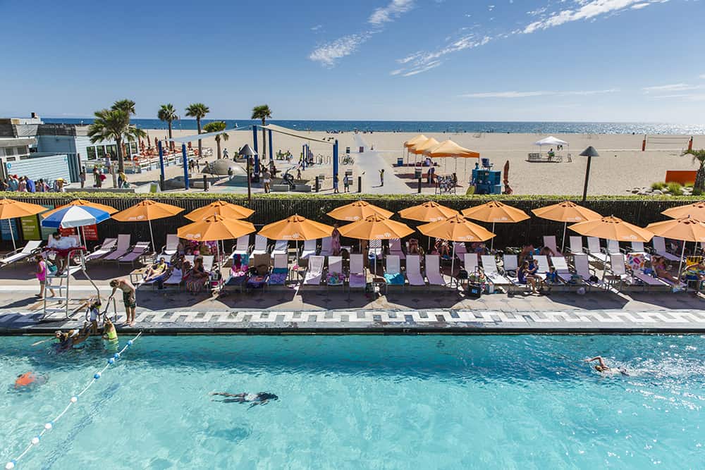 View of the pool at Annenberg Community Beach House overlooking the Pacific Ocean