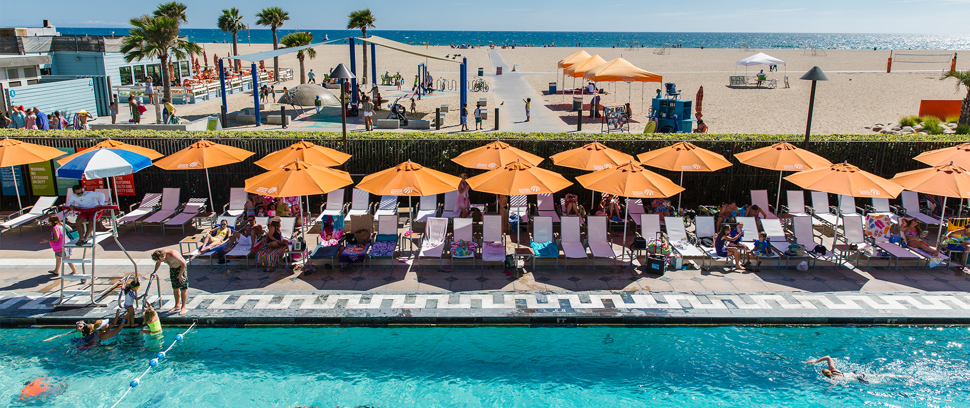 Swimming pool on a sunny day at the Annenberg Community Beach House in Santa Monica