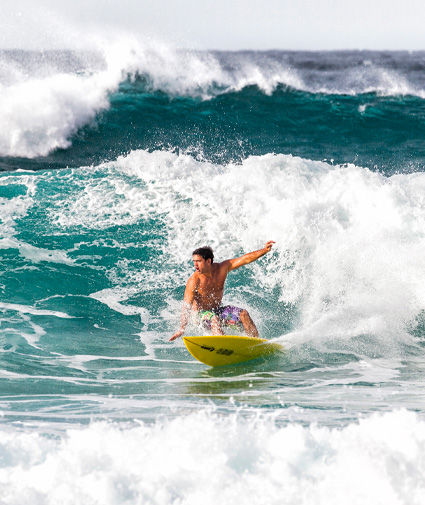 Man surfing a wave in the ocean