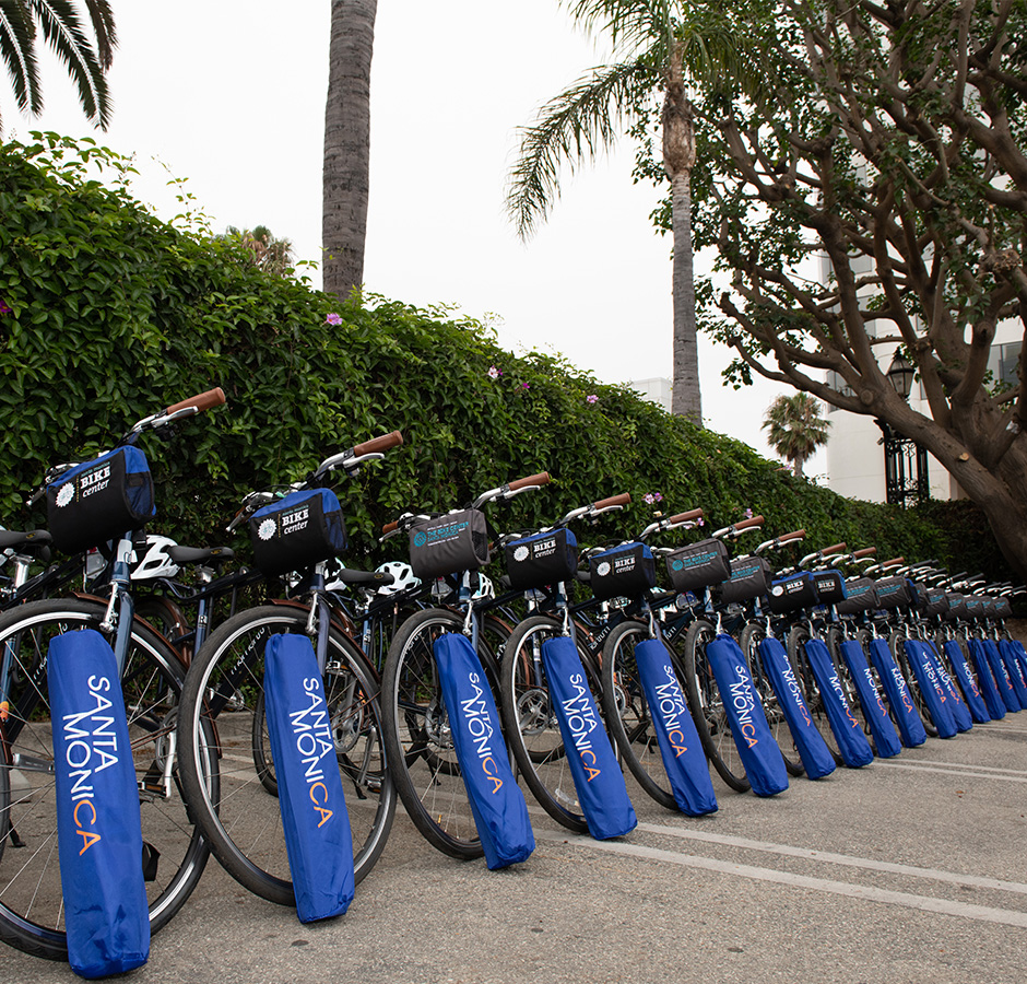 Bikes lined up outside with yoga mats