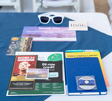 Resource books and sunglasses laid out nicely on table