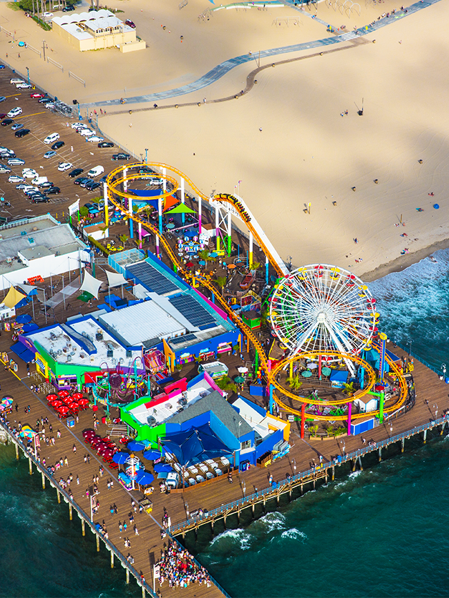 Aerial of Santa Monica Pier and Pacific Park.