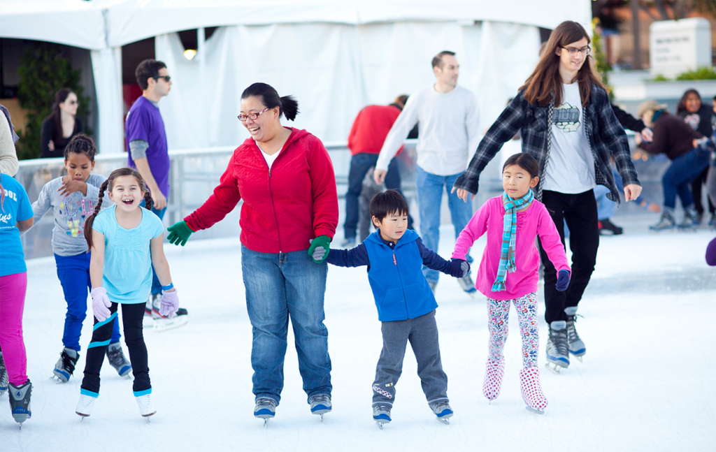 Family ice skating at Santa Monica ICE.
