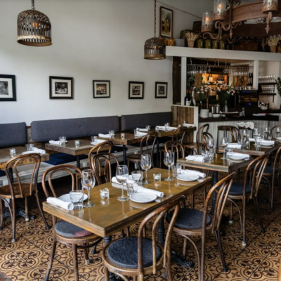 Picture of modern, rustic restaurant tables at Manchego Santa Monica