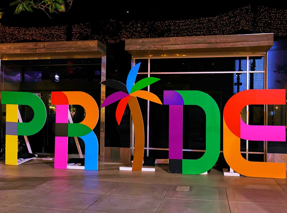 Picture of PRIDE sign in front of store doors