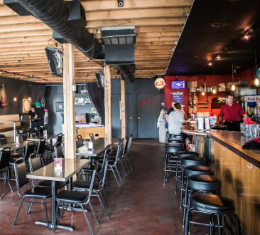 inside photo of bar and seating of trip